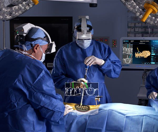 two surgeons using xvision ar in the operating room