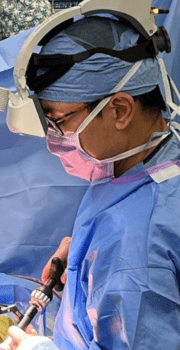 John Shin performs surgery with AR goggles.