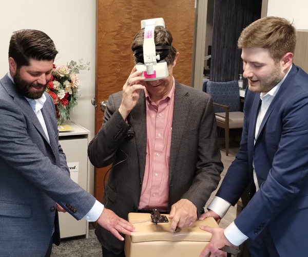 A man tests an augmented reality headset used for spine surgery